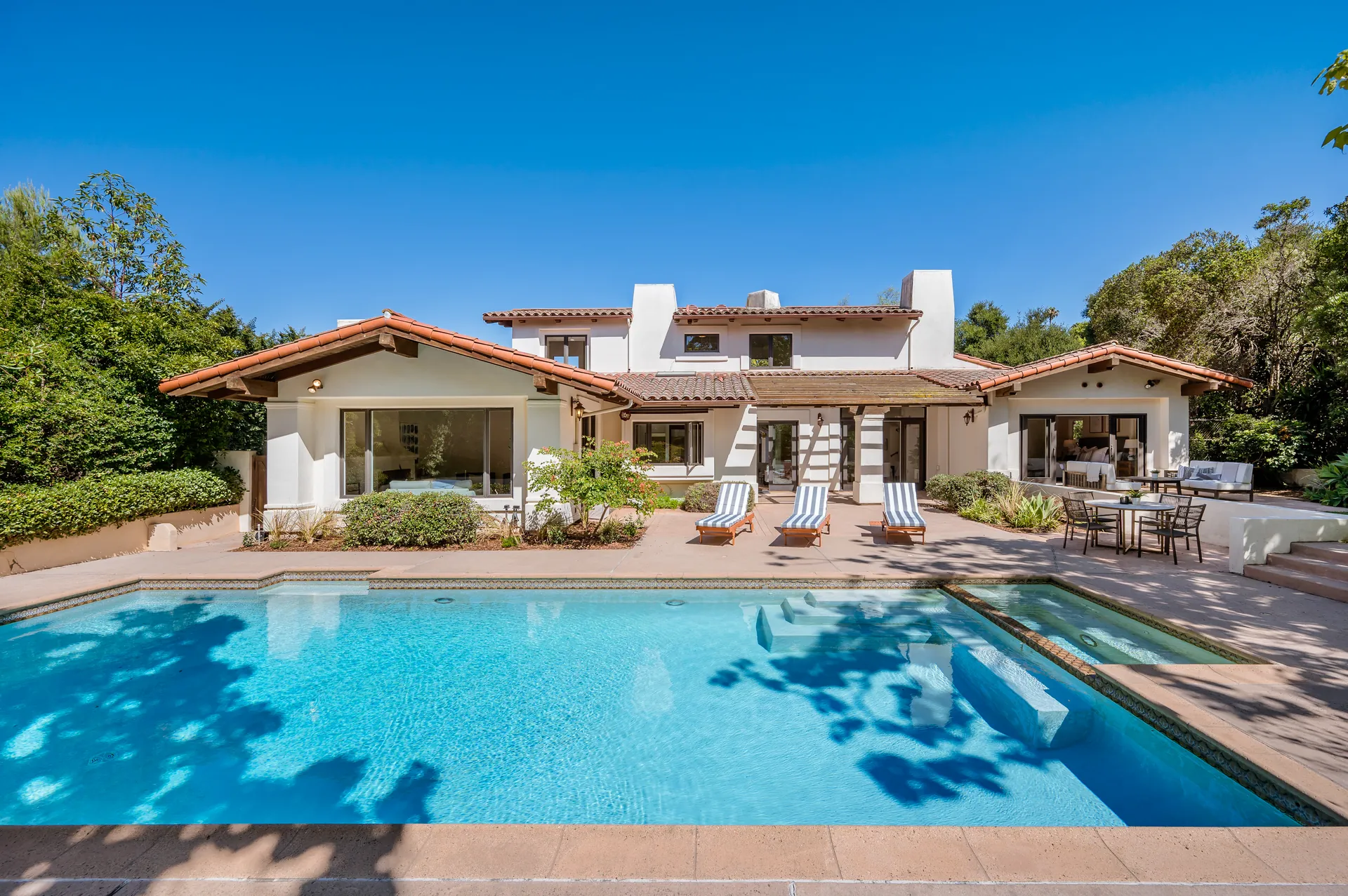 Andalusian villa with terracotta roofs, white walls and a large pool