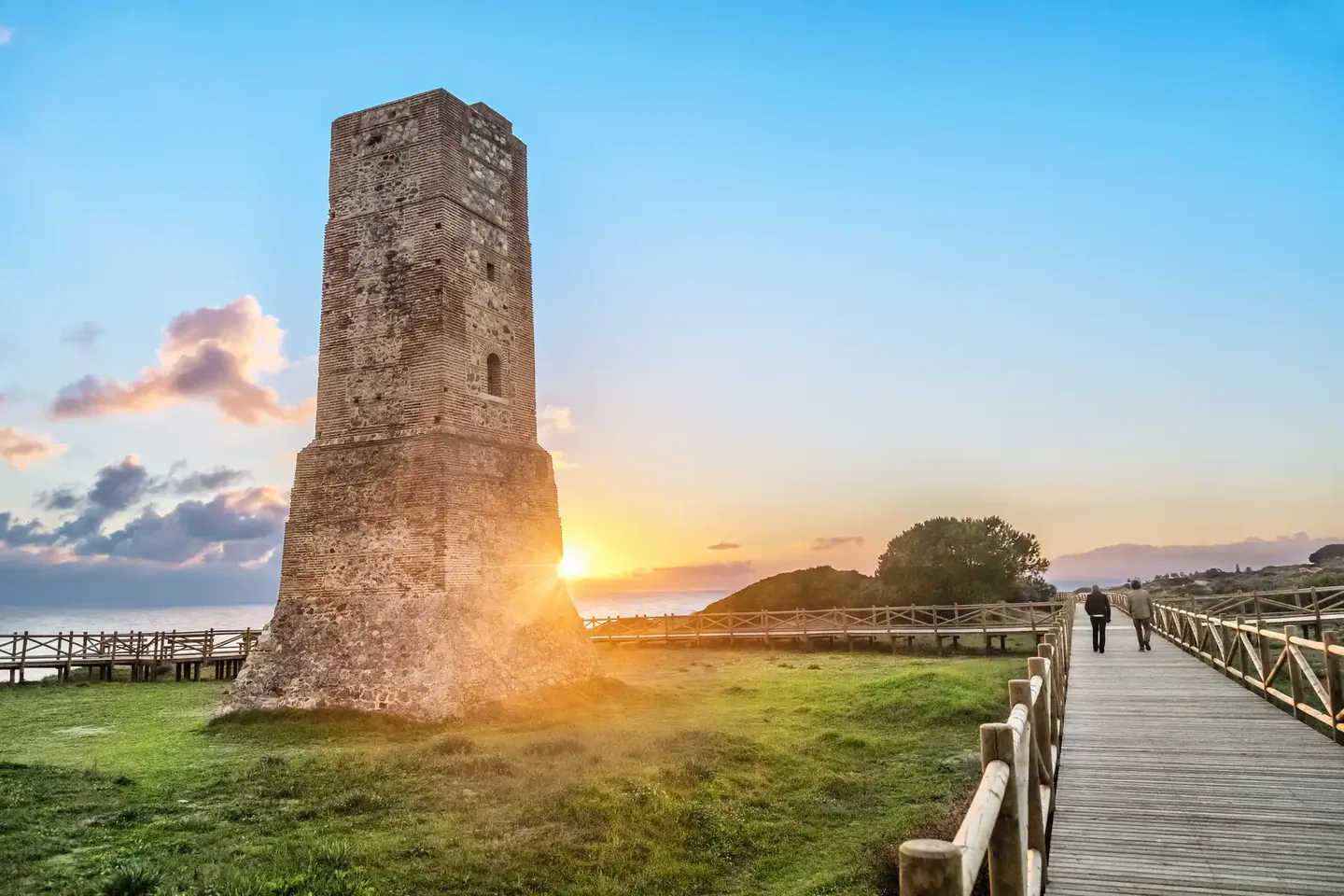 Torre de los Ladrones watchtower near Cabopino at sunset