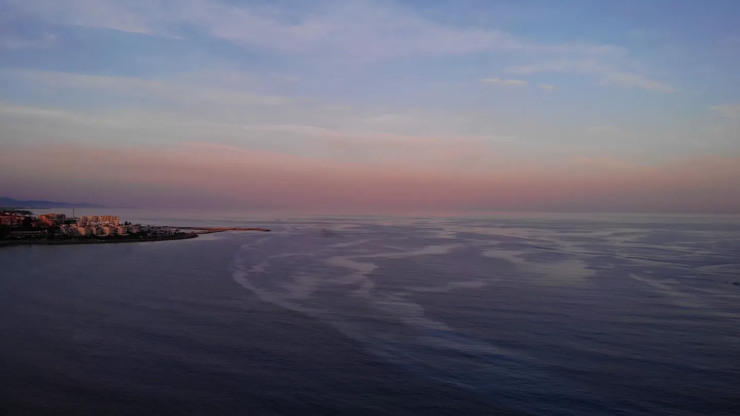 The coast near Estepona under a soft evening sky