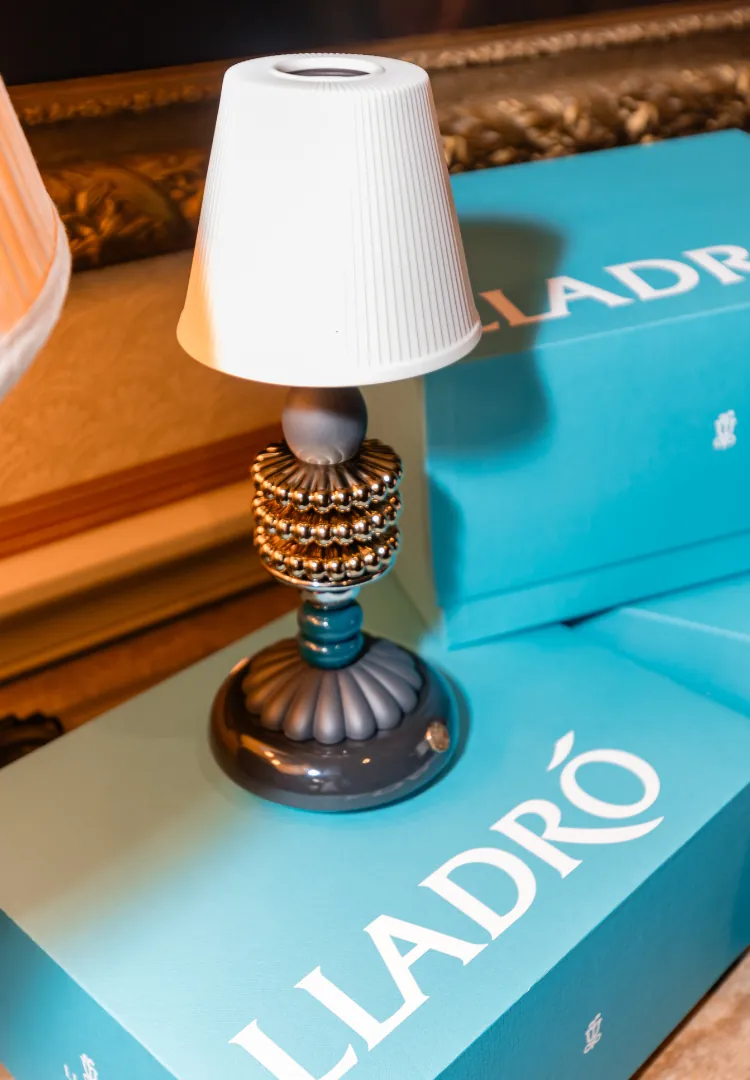 Lladró Firefly cordless table lamp with a porcelain dome