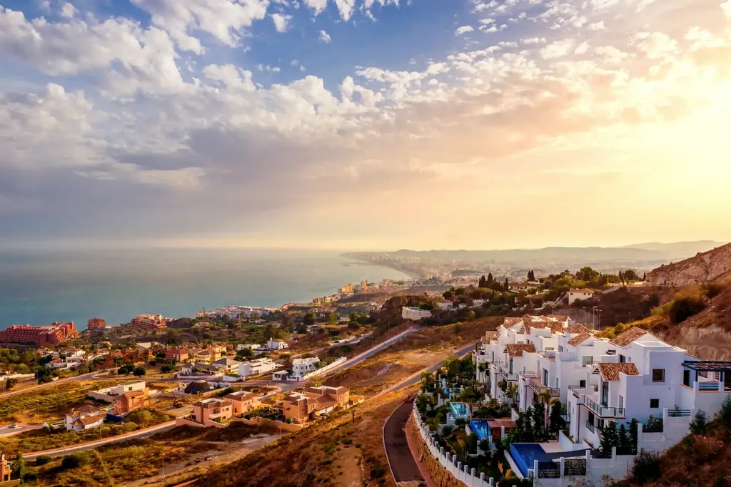 White houses on the hills above Marbella at sunrise